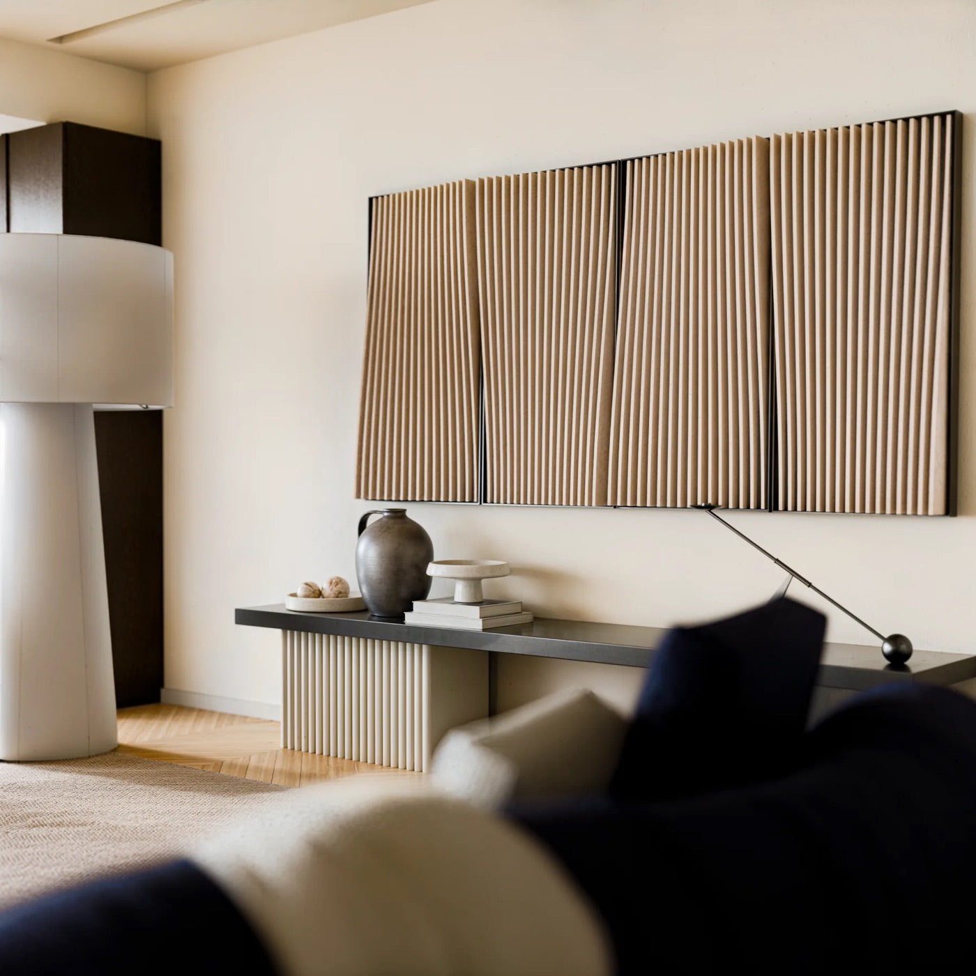 Sandstone Rhythm panels above a console in a living room